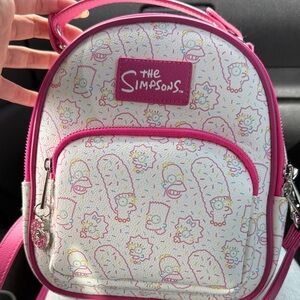 Pink and White universal Simpsons mini backpack